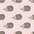 Hedgehog seamless pattern on pink polka dots background.