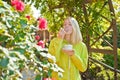 Hedonism and gourmet. Enjoy delicious creamy cappuccino in blooming garden. Girl drink gourmet cappuccino. Coffee time Royalty Free Stock Photo