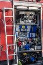 Open back side of German fire truck with water supply connection. Vertical