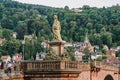 Heidelberg, Germany - Aug 1, 2020: Roman goddess Minerva sculpture on old bridge after sunset