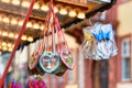 Heidelberg, Germany - December 2020: Heart shaped gingerbread candy with sugar icing and German text saying `Happy Holiday`