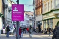 Heidelberg, Germany - December 2020: Signs for face mask and distance requirement in German city center of Heidelberg