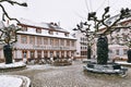 Heidelberg, Germany - Town square called `Karlsplatz` with empty restaurant and snow in winter
