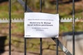 Heidelberg, Germany, Infomation sign at closed entrance gate of Monastery of St. Michael about closure due to Corona virus