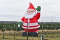 Heidelberg, Germany - Large inflatable Santa Claus at Christmas tree market called called `Christbaum Center`