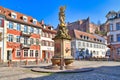 Heidelberg, Germany, Square called `Kornmarkt` in old historical city center, fountain with golden Madonna statue Royalty Free Stock Photo