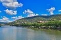 Heidelberg neckar river with old historical buildings and Odenwald mountain range with famous castle in Germany Royalty Free Stock Photo