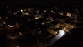 From the height of the quadcopter at night, the village below twinkles like a scattering of gemstones on a velvet cloth