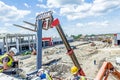 Height workers in cherry picker are working on new metal canopies Royalty Free Stock Photo