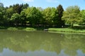 Gunderath, Germany - 05 19 2020: mirror calm Heilbachsee in spring