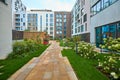 Heilbronn, Germany - August 12, 2019. Modern homes during the Federal Garden Show 2019 BUGA Heilbronn. Concrete walkways and green