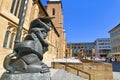 Heilbronn, Germany - Sculpture called `Christophorus` with gothic hall church St. Kilian`s in background in Heilbronn Royalty Free Stock Photo