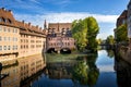 Nuremberg, Heilig-Geist-Spital which is reflected in the waters of the Pegnitz river. Franconia, Germany Royalty Free Stock Photo