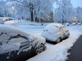 Winter attack in Germany. Heavy snowfall in NRW in the Mettmann county. Snow-covered roads and cars.