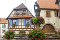 Heiligenstein (Alsace) - Fountain with flowers Royalty Free Stock Photo