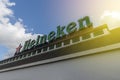 Heineken brand logo on the top of the building
