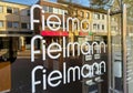 View on store display window with logo lettering of Fielmann optician