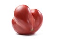 Heirloom fresh juicy red tomato irregular in shape isolated Royalty Free Stock Photo