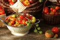 Heirloom variety tomatoes in baskets on rustic table. Colorful tomato - red,yellow , orange. Harvest vegetable cooking conception Royalty Free Stock Photo