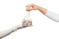 Healthcare worker`s hand giving tissues