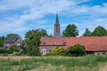 Helden, Limburg, The Netherlands - Landscape view over the green surroundings of the village and the church tower Royalty Free Stock Photo