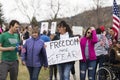 Helena, Montana - April 19, 2020: A woman protesting and holding a freedom over fear sign at a Rally during the Coronavirus