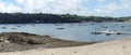 Panoramic view across the picturesque Helford River to Helford River Sailing Club in Cornwall, UK