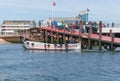 Ferry with passengers leaving harbor Helgoland to nearby island Dune. Royalty Free Stock Photo