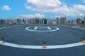 The Heli Copter parking lot on the deck with blue sky in the capital of Thailand. Space for helicopter landing on high-rise