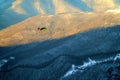 Heli ski service helicopter winter mountain aerial view in Krasnaya Polyana.