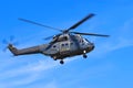 Helicopter against blue sky Royalty Free Stock Photo