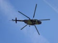 Helicopter against blue sky taken from below Royalty Free Stock Photo