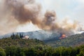 Helicopter against wildfire during strong wind and drought near Miren Castle in Slovenia