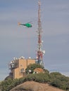 Helicopter approaching communications tower of Sant Jeroni Royalty Free Stock Photo
