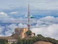Helicopter approaching communications tower of Sant Jeroni Royalty Free Stock Photo