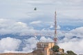 Helicopter approaching communications tower of Sant Jeroni Royalty Free Stock Photo