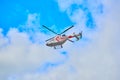 Helicopter on the background of the sky sky and clouds Royalty Free Stock Photo