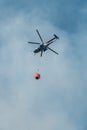 Helicopter collects water to fight fire in Corsica