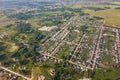 Helicopter drone shot village with road