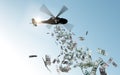 Helicopter dropping money in sky