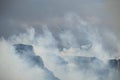 CAMPS BAY, CAPE TOWN, 13 October 2017 - Helicopter fights Camps Bay fire fanned by strong westerly winds.
