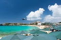 Helicopter flies over the beach, Maho bay, Caribbean Royalty Free Stock Photo