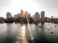 Helicopter flight Aerial view images skyline Boston MA, USA during sunset behind the skyscrapers near waterfront bay Royalty Free Stock Photo