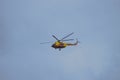 Helicopter Flight yellow windship in the blue sky Royalty Free Stock Photo
