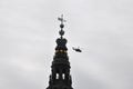 Helicopter flying over Christiasn brig castle in Copenhagen