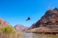 Helicopter flying over Grand Canyon National Park Royalty Free Stock Photo