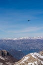 Helicopter flying over the Kotor Bay in winter