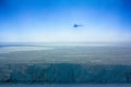 Helicopter over clouded Arctic glaciers. Royalty Free Stock Photo