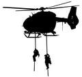 Helicopter H 145 M / H145M Air Force, German Air Force, Police Special Forces abseil from helicopter. silhouette