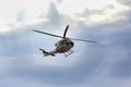 Helicopter of italian military force Carabinieri patrols Rome`s street from the sky on a cloudy day